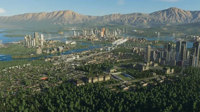 Ciudad junto al lago, con montañas al fondo