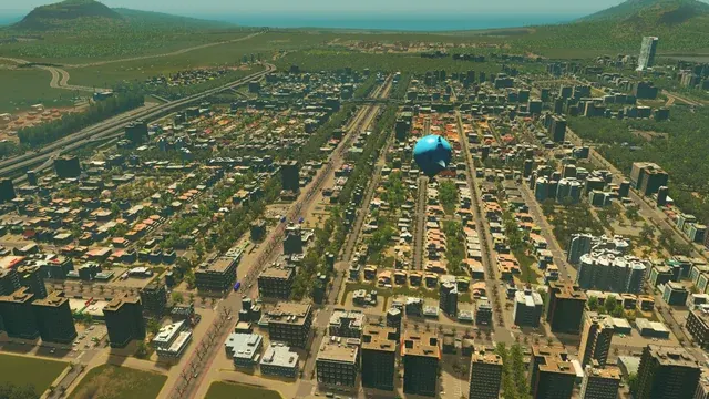 Vista aérea con dirigible sobre la ciudad
